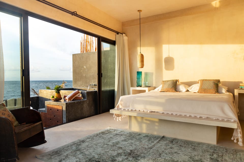 Cielo Master Deluxe Oceanfront king size bed with plunge pool and terrace | Premium bedding, in-room safe, individually decorated