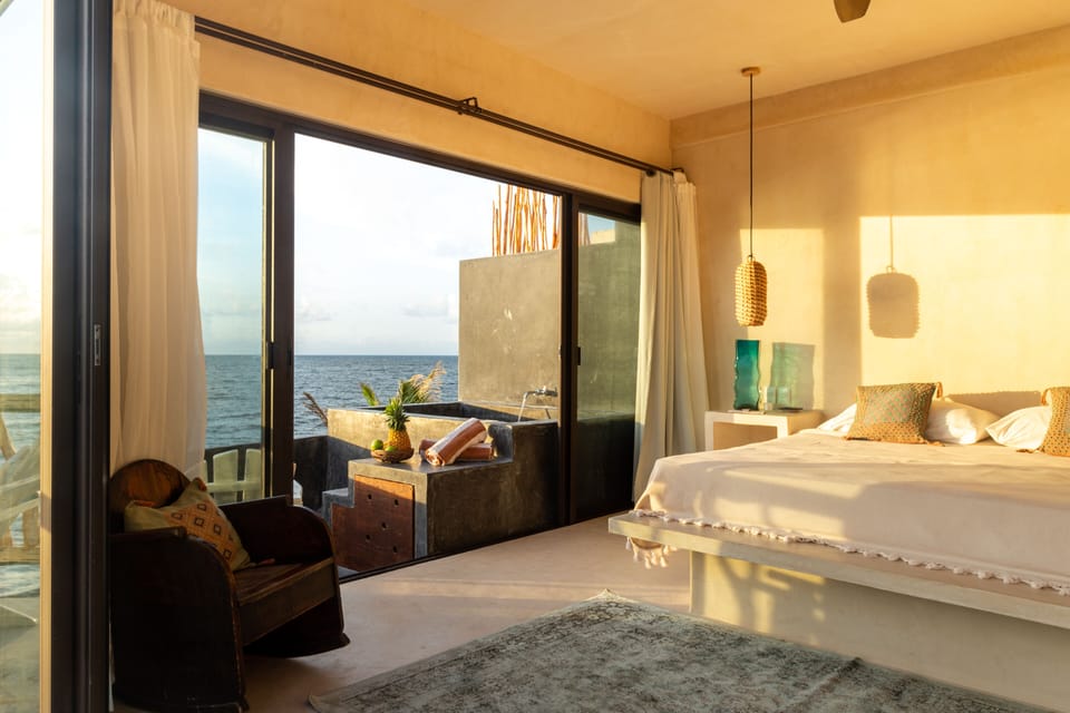 Cielo Master Deluxe Oceanfront king size bed with plunge pool and terrace | Premium bedding, in-room safe, individually decorated