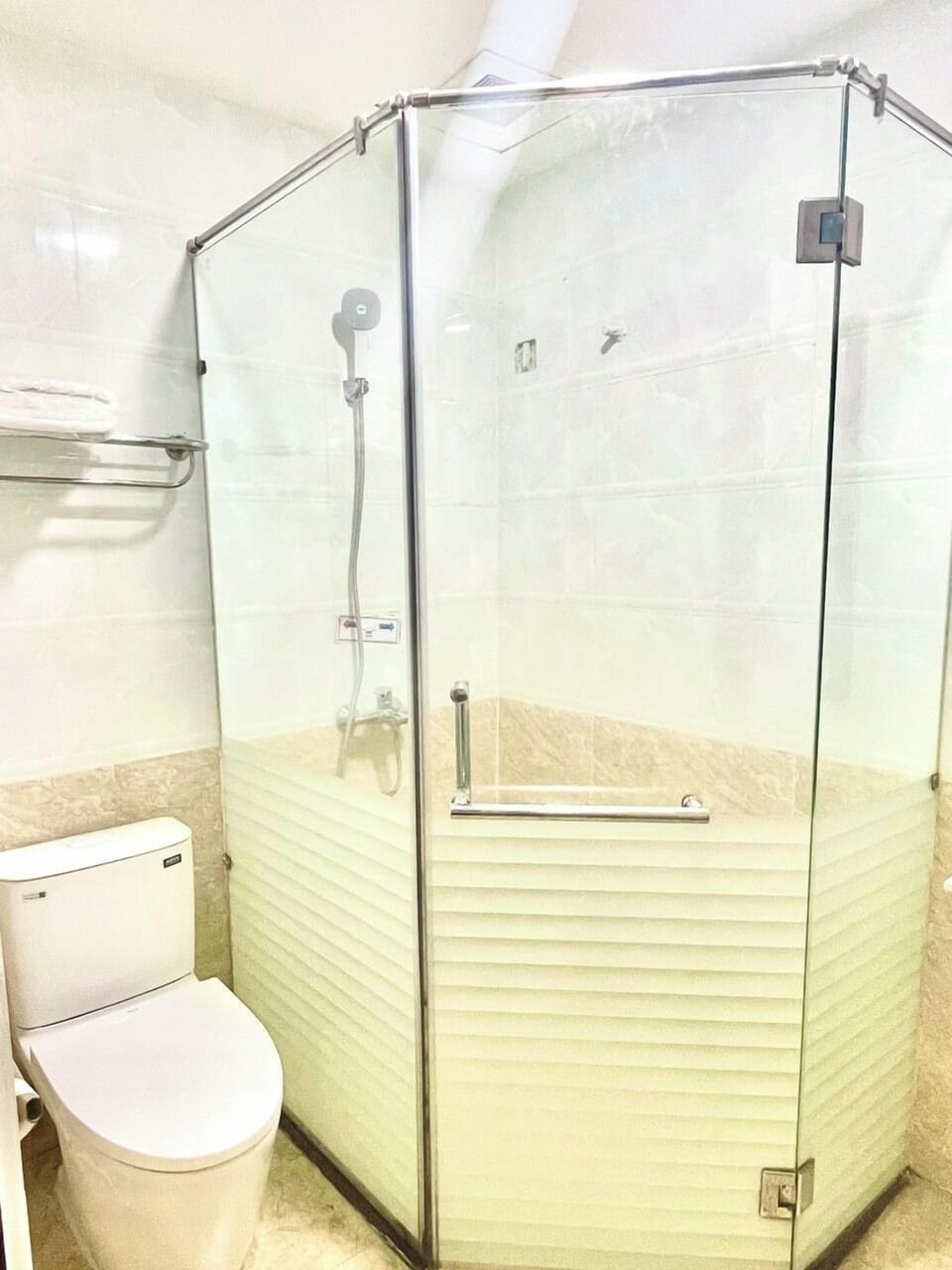 Shower, free toiletries, hair dryer, slippers