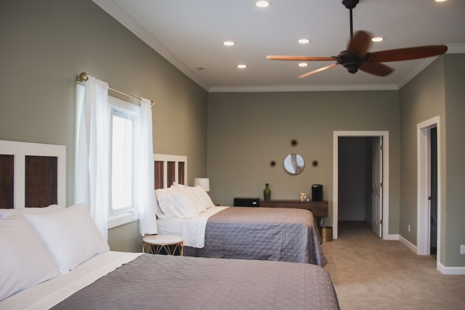 Deluxe Room, 2 Queen Beds, Private Bathroom | Premium bedding, individually decorated, individually furnished, desk