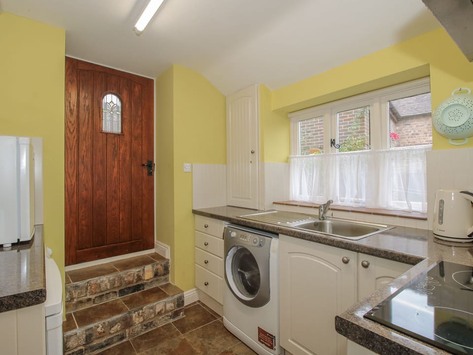 Fridge, microwave, cookware/dishes/utensils