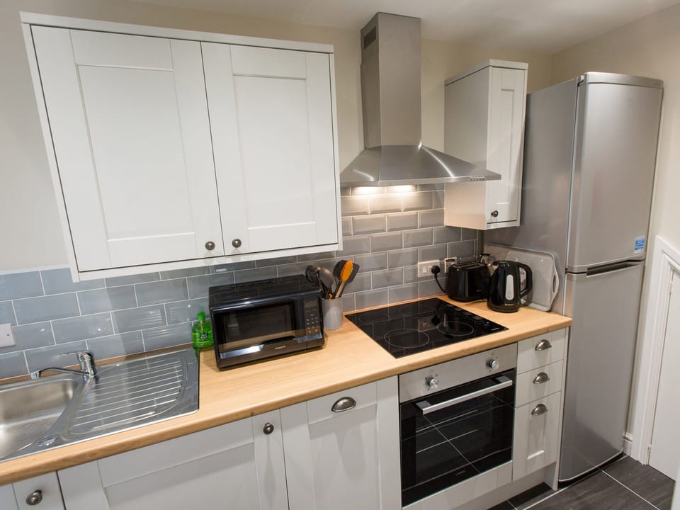 Cottage | Private kitchen | Microwave, stovetop, dishwasher, highchair