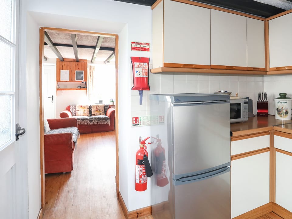 Cottage | Private kitchen | Dishwasher, highchair, cookware/dishes/utensils
