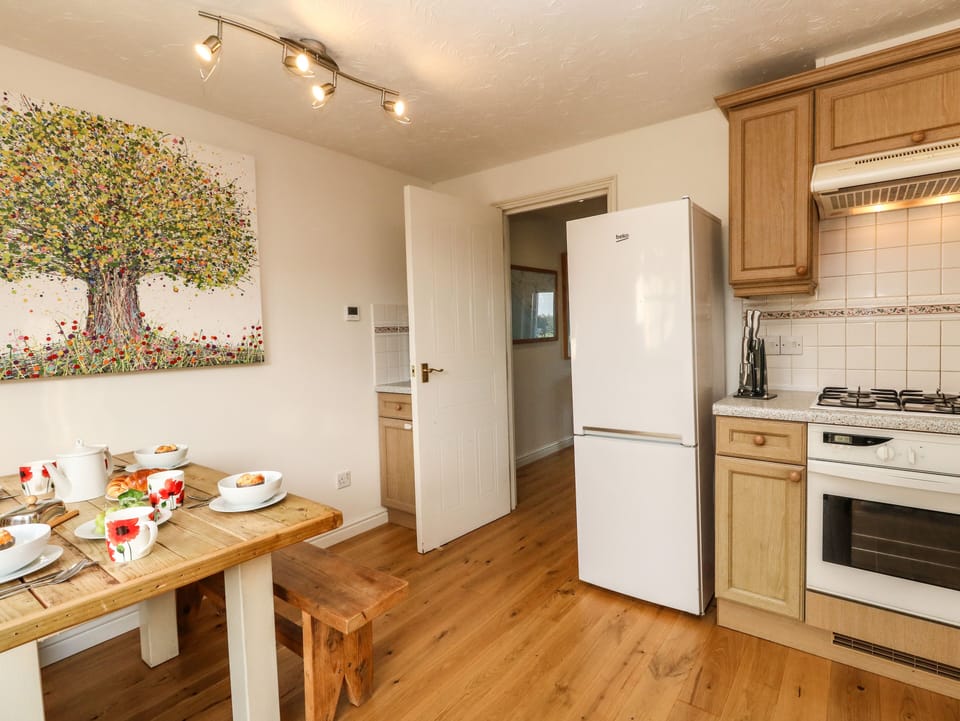 Cottage | Private kitchen | Stovetop, dishwasher, highchair, cookware/dishes/utensils