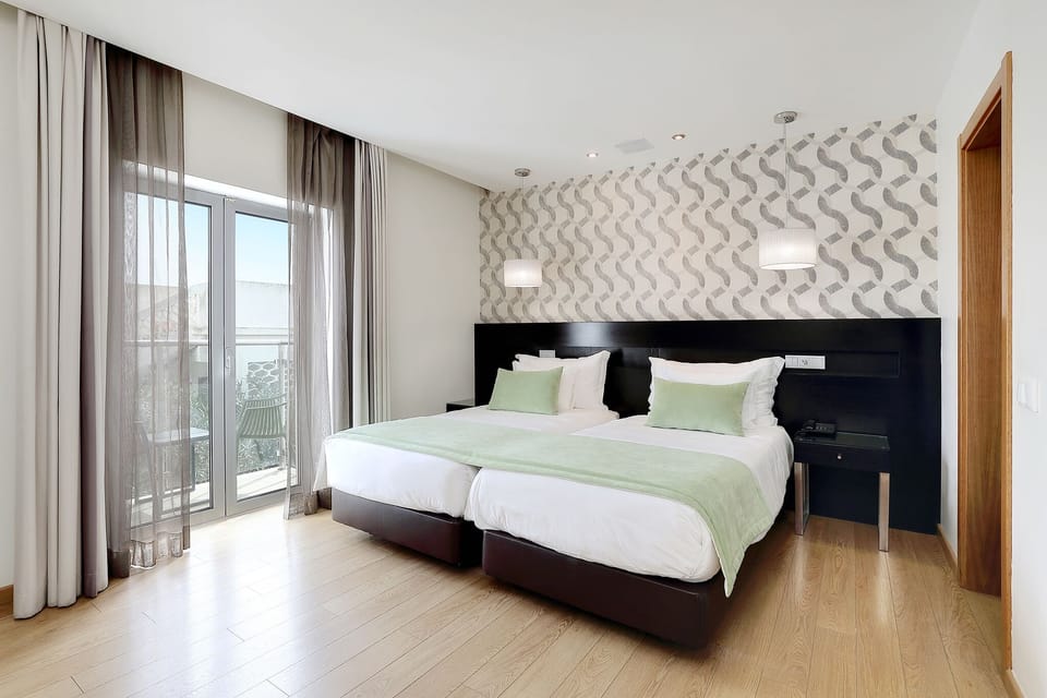 Twin Room, Terrace | Minibar, in-room safe, blackout drapes, free WiFi