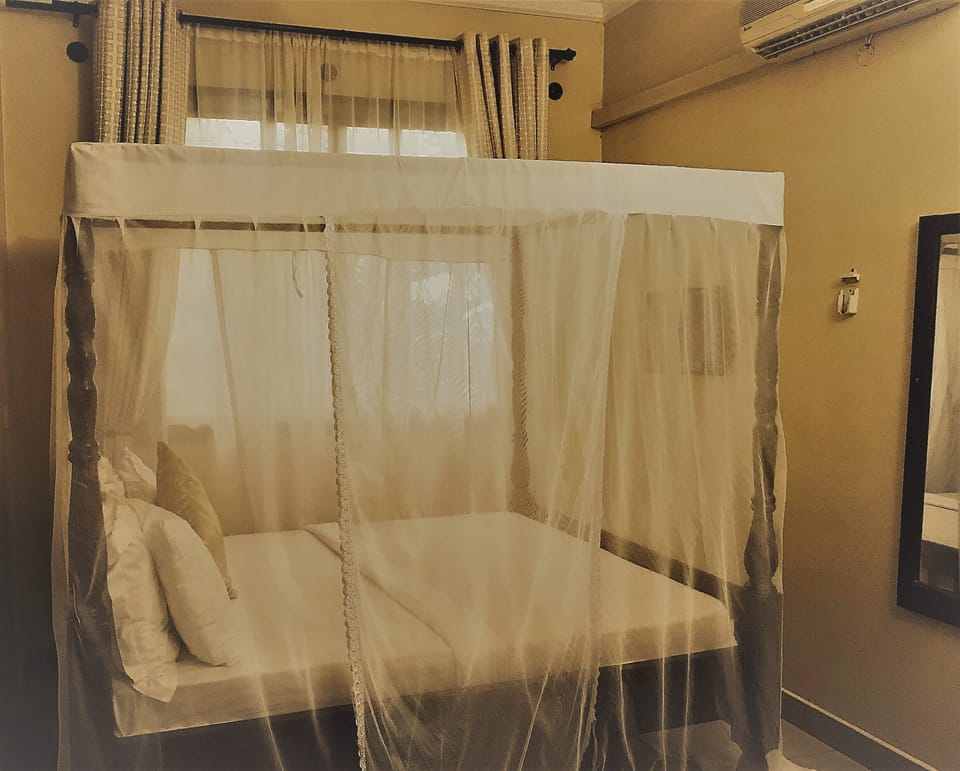 Desk, laptop workspace, free WiFi, bed sheets