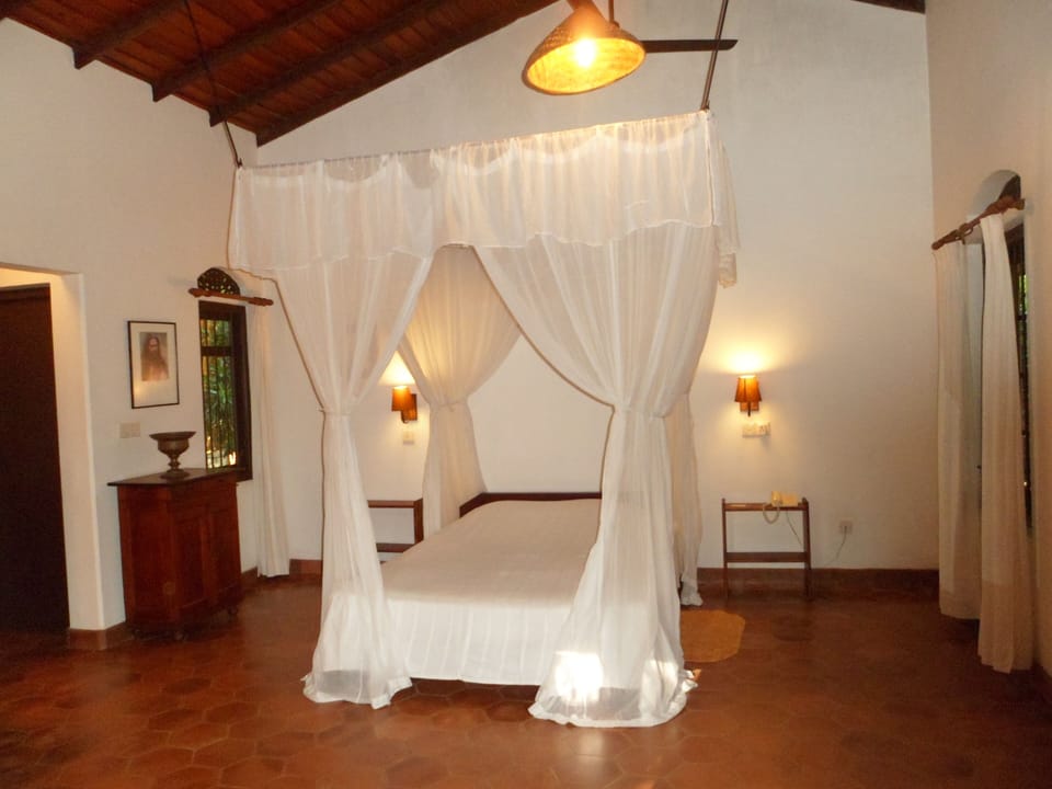 Desk, blackout drapes, bed sheets