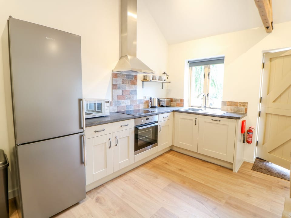 Cottage | Private kitchen | Fridge, microwave, dishwasher, electric kettle