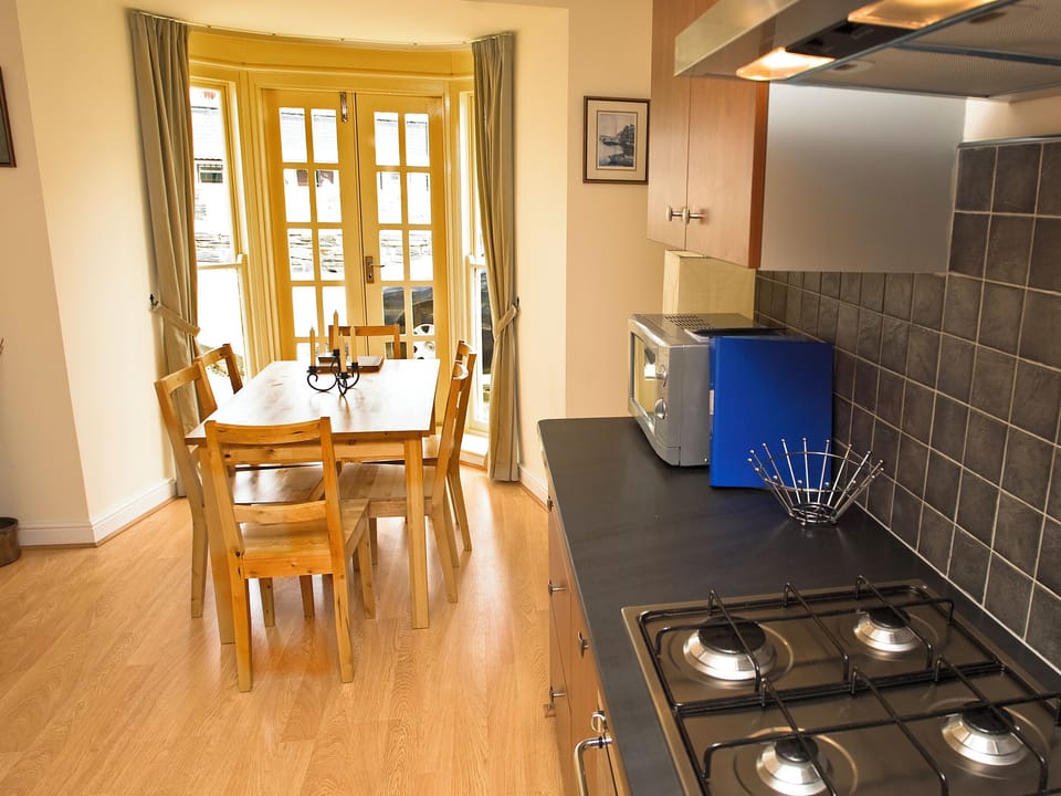 Cottage | Private kitchen | Dishwasher, highchair, cookware/dishes/utensils