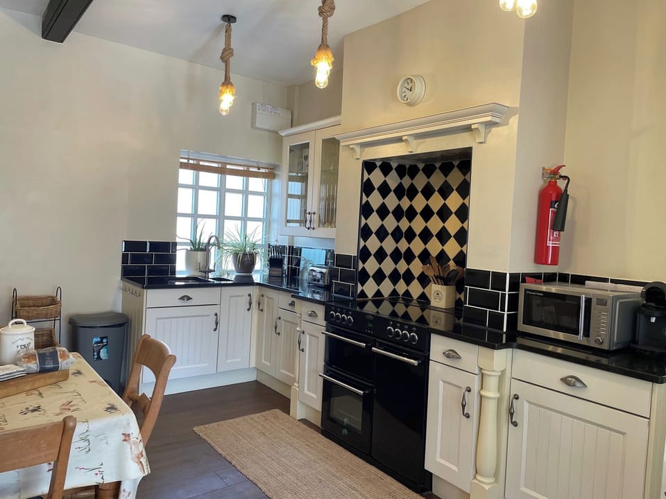 Cottage | Private kitchen | Highchair, cookware/dishes/utensils