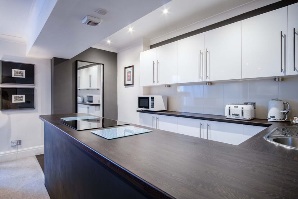 Superior Apartment, Ensuite (2 Bedroom self Catering) | Private kitchen | Highchair