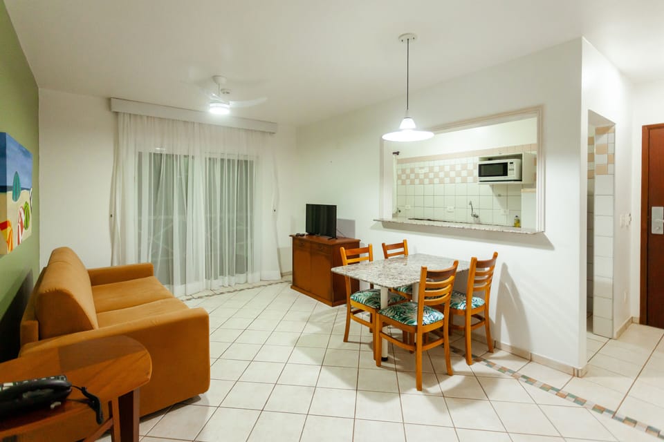 Family Apartment | Living area | 32-inch LED TV with cable channels, TV, table tennis