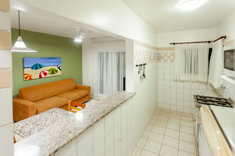 Family Apartment | Living area | 32-inch LED TV with cable channels, TV, table tennis