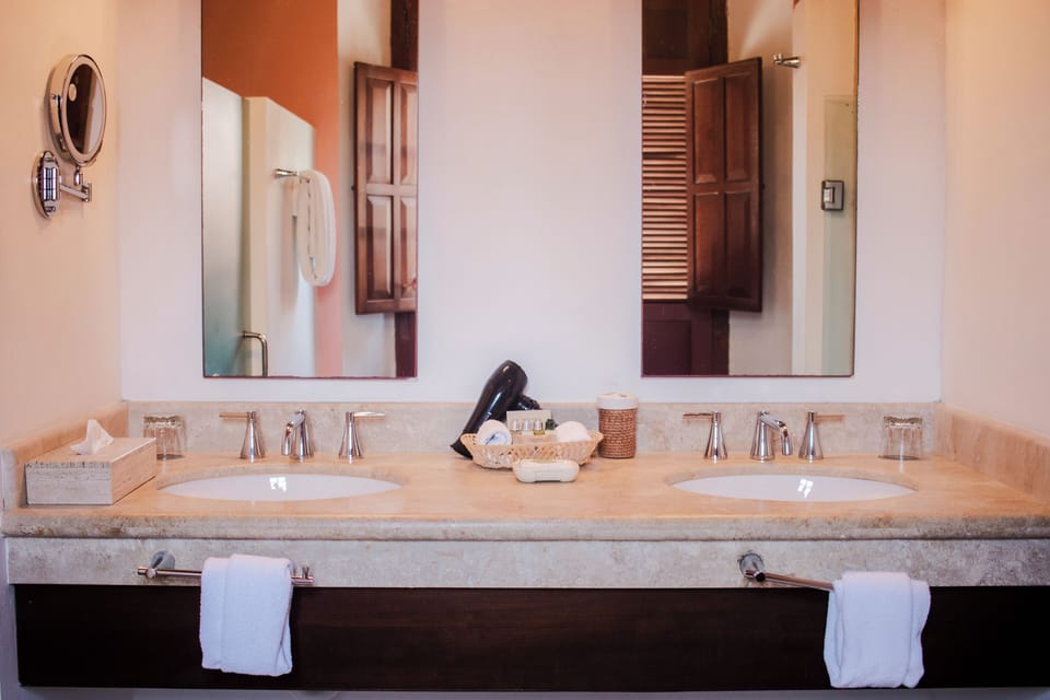 Shower, designer toiletries, hair dryer, bidet