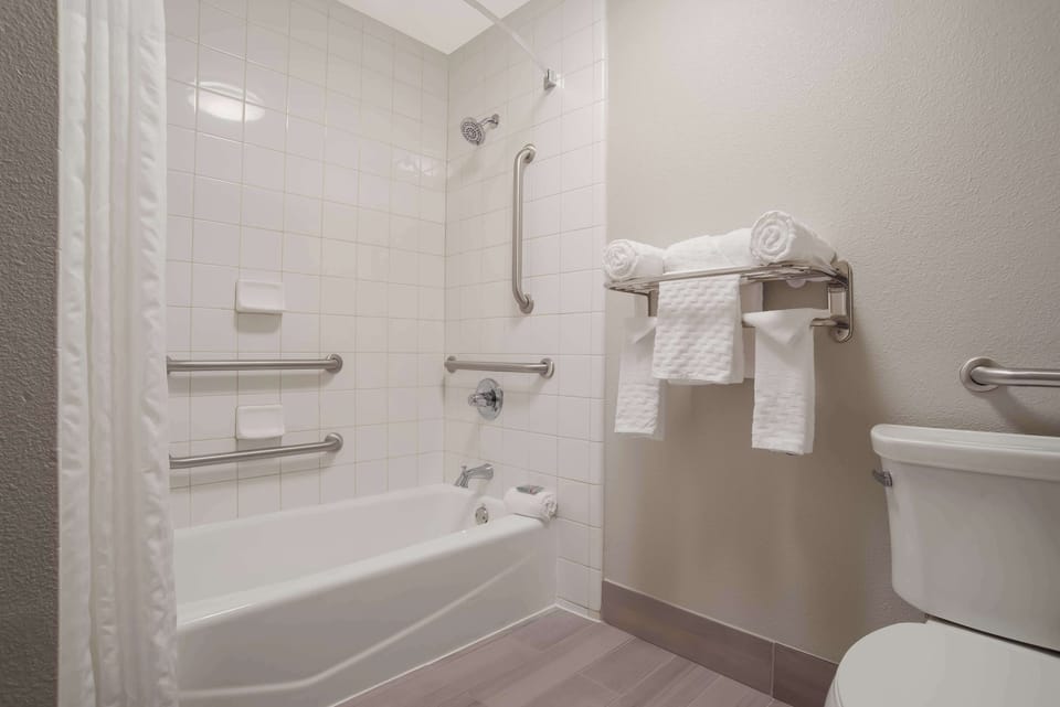 Standard Room, 1 King Bed, Accessible, Refrigerator & Microwave | Bathroom | Combined shower/tub, deep soaking tub, free toiletries, hair dryer