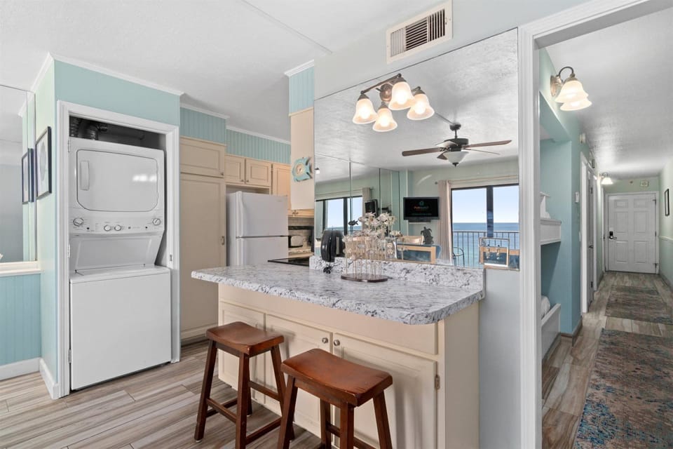 Condo, 1 King Bed with Sofa bed (The Summit 1030) | Bathroom | Hair dryer, towels