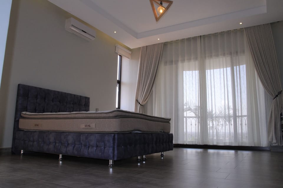 Family Apartment | 3 bedrooms, in-room safe, blackout drapes, iron/ironing board