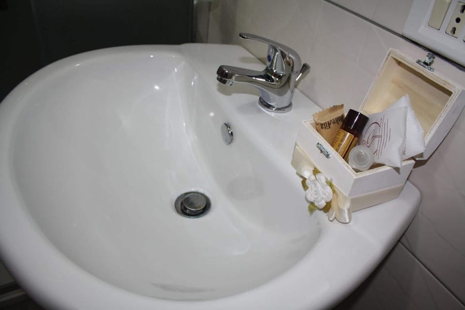 Shower, free toiletries, hair dryer, bathrobes