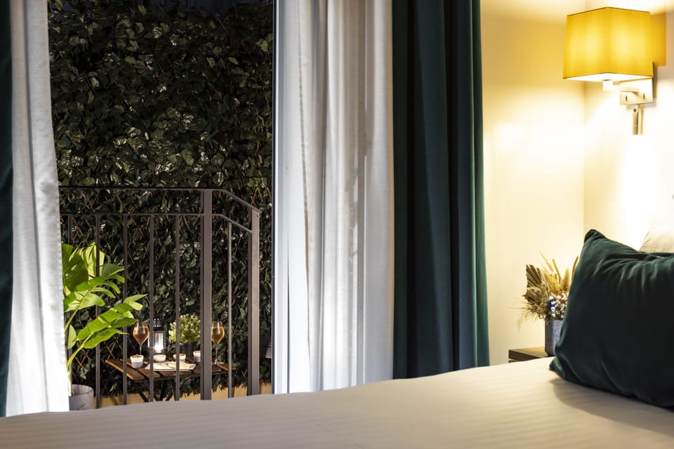 Superior Double Room | Minibar, in-room safe, desk, blackout drapes