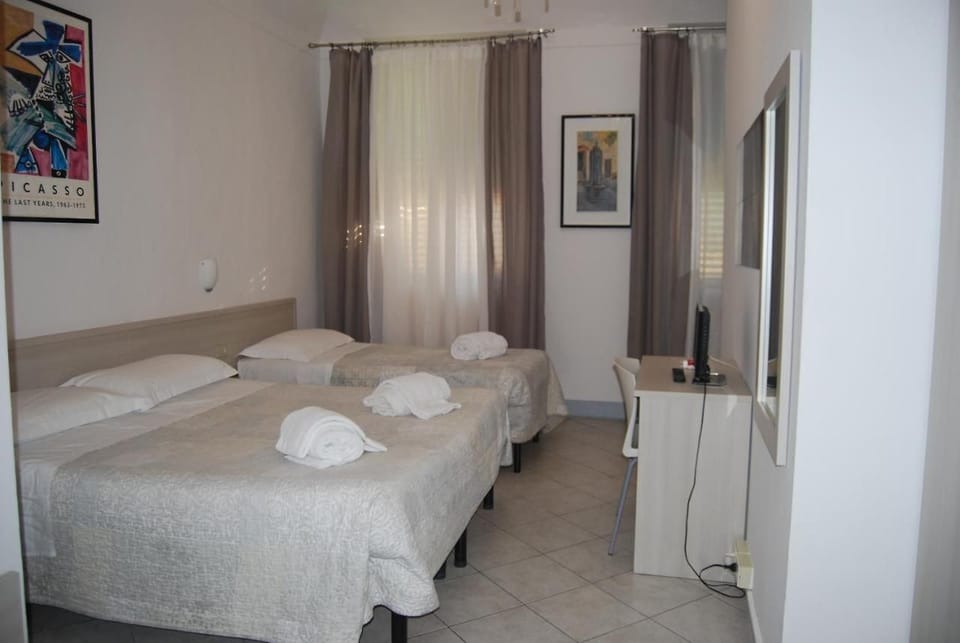 Desk, laptop workspace, rollaway beds, free WiFi