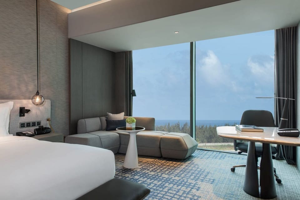 Premium bedding, down comforters, pillowtop beds, minibar