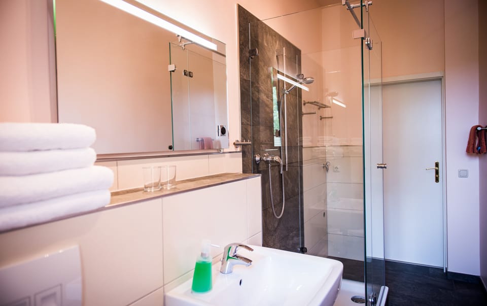 Apartment, 2 Bedrooms | Bathroom | Hair dryer, towels