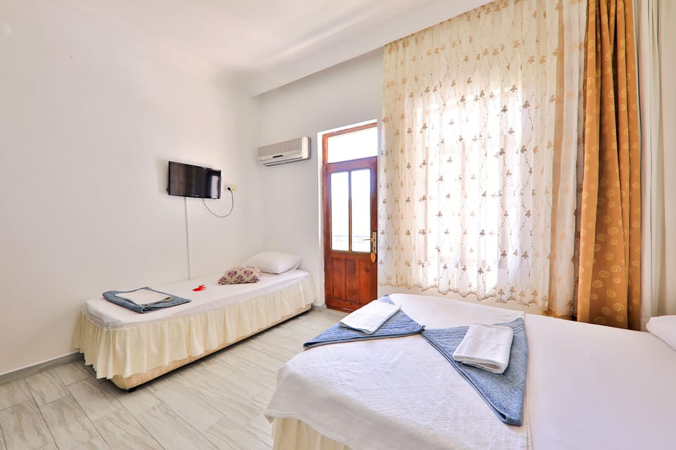 Classic Triple Room | Egyptian cotton sheets, premium bedding, down comforters, in-room safe