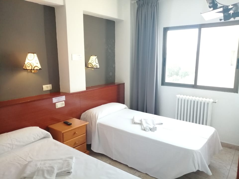 Twin Room | Egyptian cotton sheets, premium bedding, Select Comfort beds