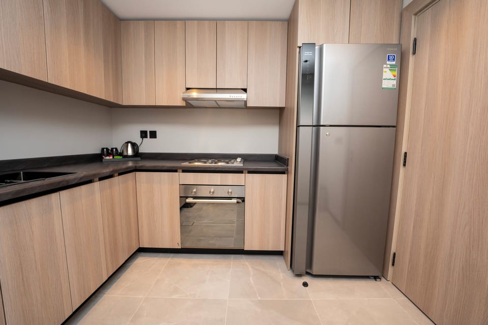 Family Apartment | Private kitchen | Cookware/dishes/utensils, paper towels