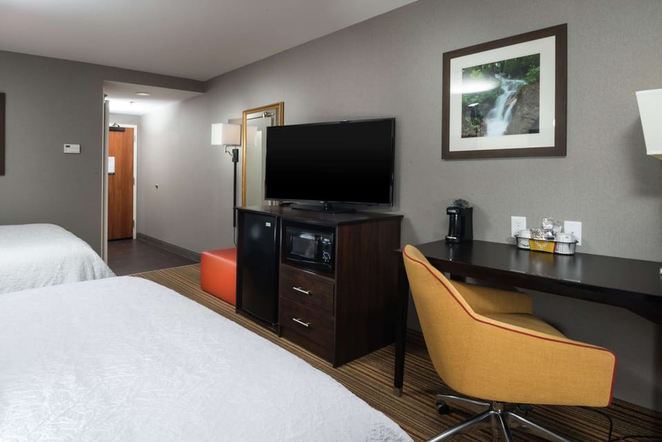 In-room safe, desk, iron/ironing board, free cribs/infant beds
