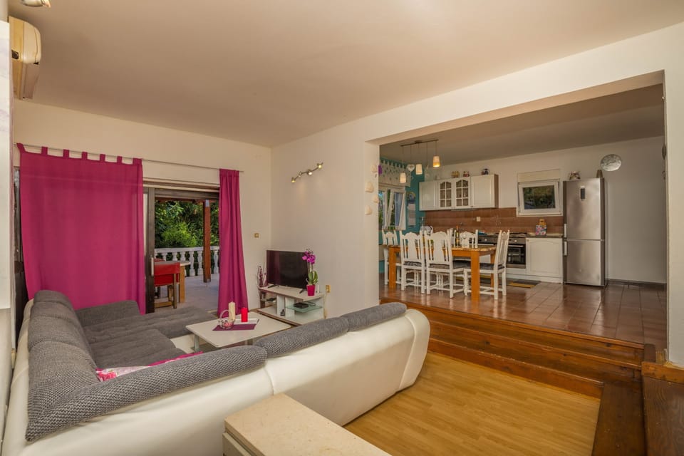 Apartment, 2 Bedrooms | Living area | Flat-screen TV
