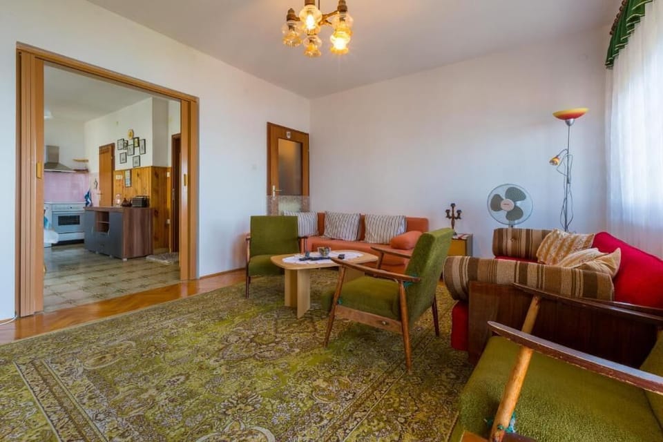 Apartment, 3 Bedrooms | Living room | Flat-screen TV