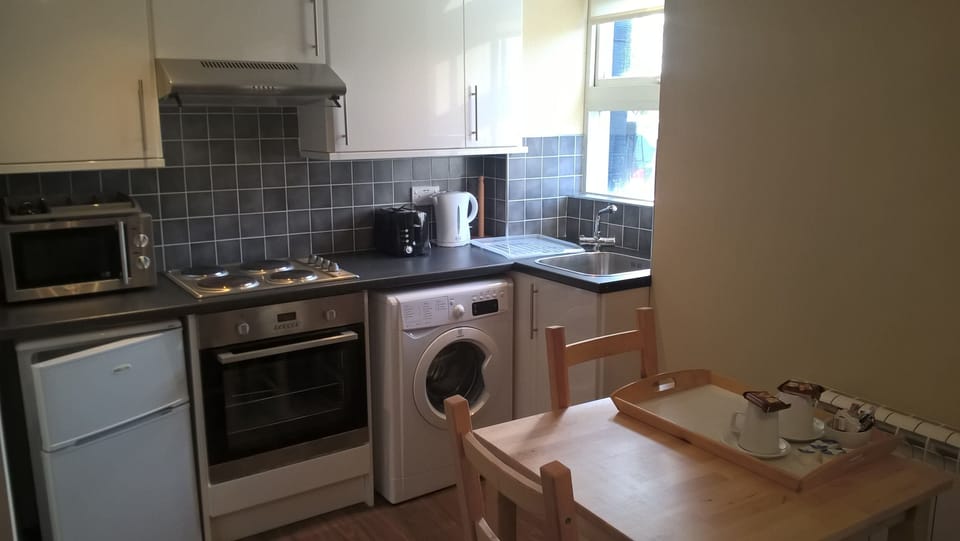 Family Apartment, Ground Floor | Iron/ironing board, rollaway beds, free WiFi