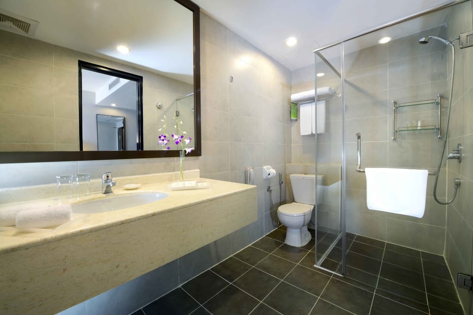 Shower, rainfall showerhead, bidet, towels