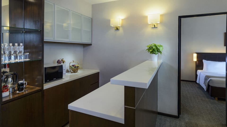 Family Two Bedroom Suite | In-room safe, desk, laptop workspace, blackout drapes