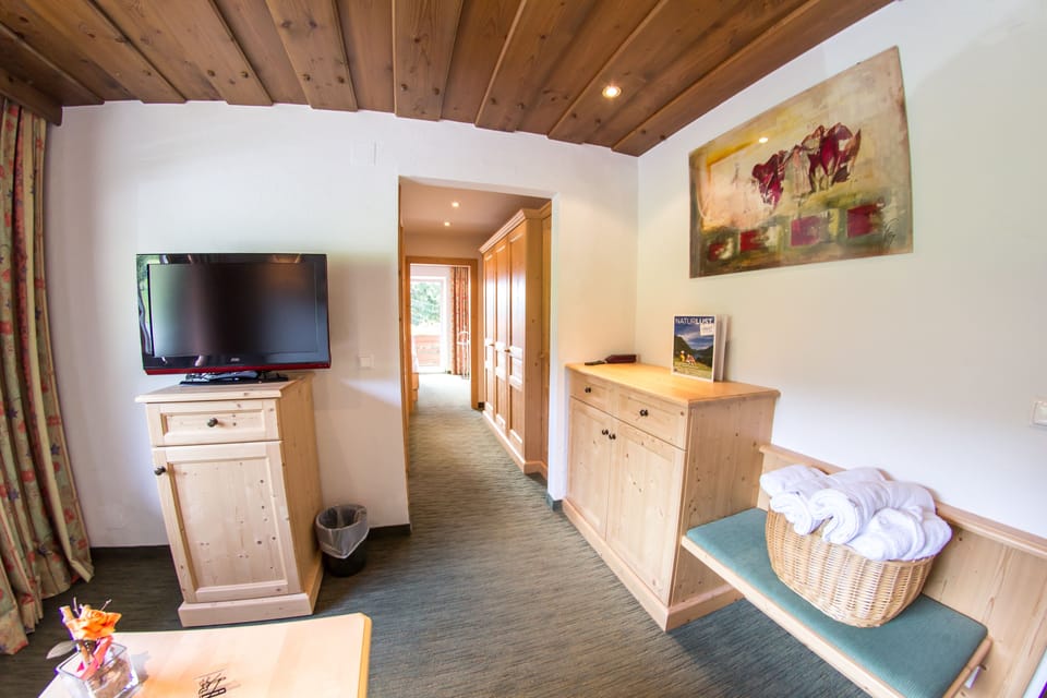 Junior Suite, 1 Bedroom, Non Smoking, Mountain View | Living area | LCD TV, heated floors