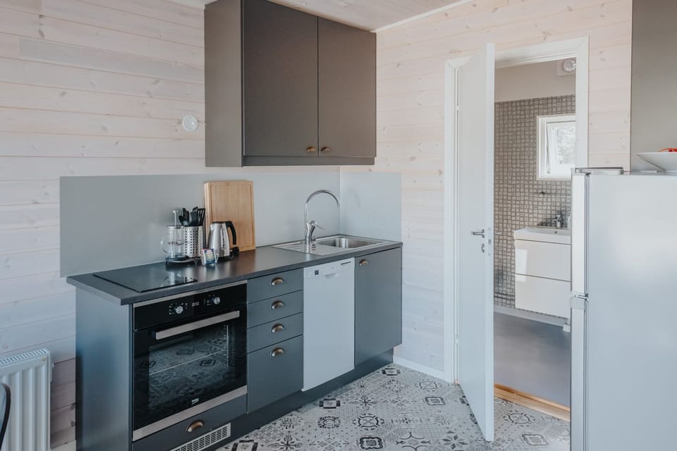 Family Cabin (bed linen not included) | Private kitchen | Fridge, oven, stovetop, coffee/tea maker