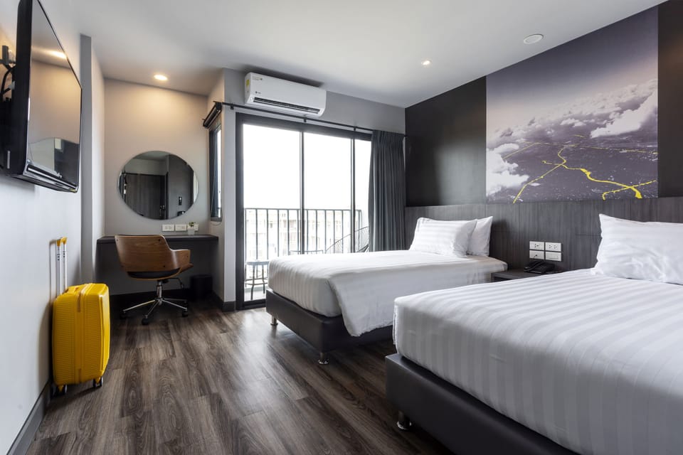Connecting Mai with Balcony | In-room safe, desk, laptop workspace, blackout drapes