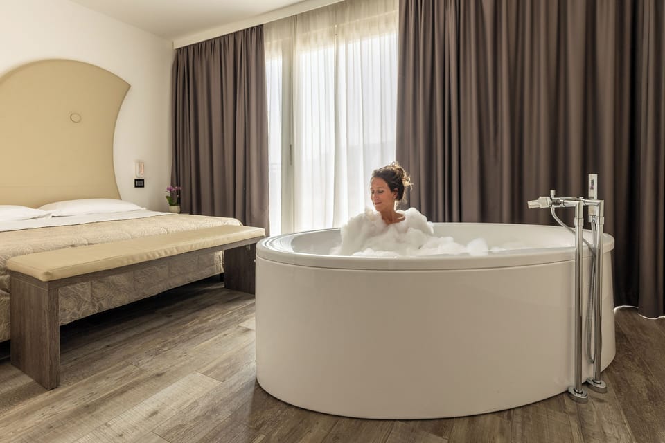 Deluxe Suite, 2 Bedrooms, Bathtub, Lakeside | Minibar, in-room safe, desk, blackout drapes