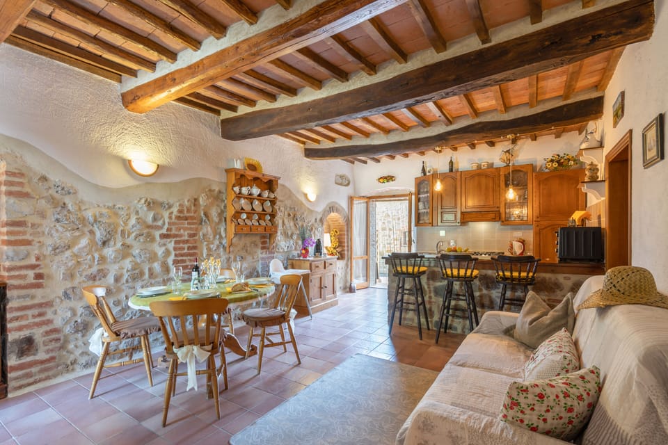 Comfort Apartment, Pool View (Giulia) | Living area | Flat-screen TV