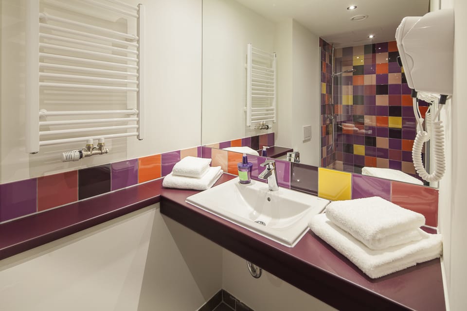 Shower, free toiletries, hair dryer, towels