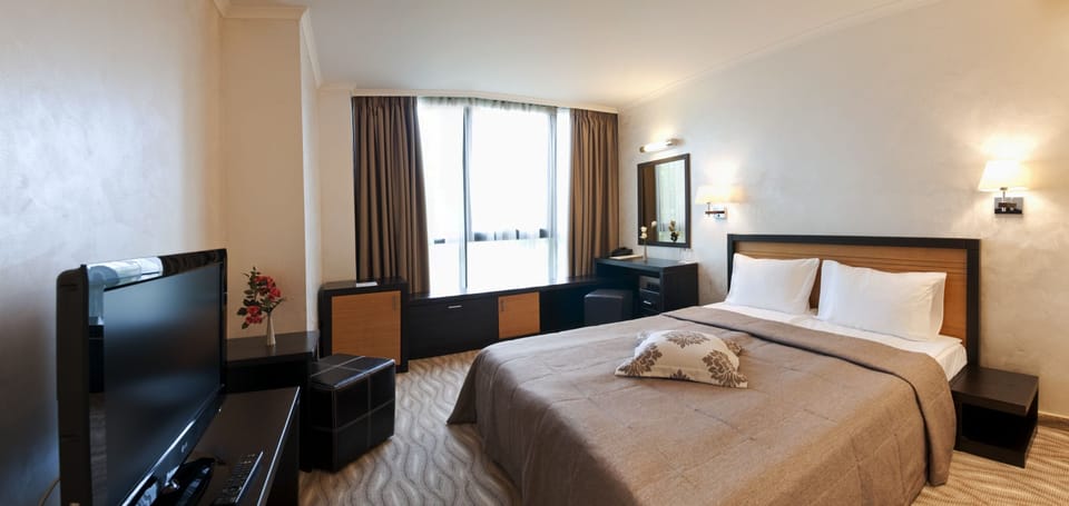 Double Room | Premium bedding, minibar, in-room safe, individually decorated