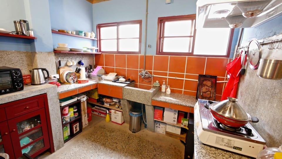 Full-size fridge, stovetop, electric kettle, rice cooker
