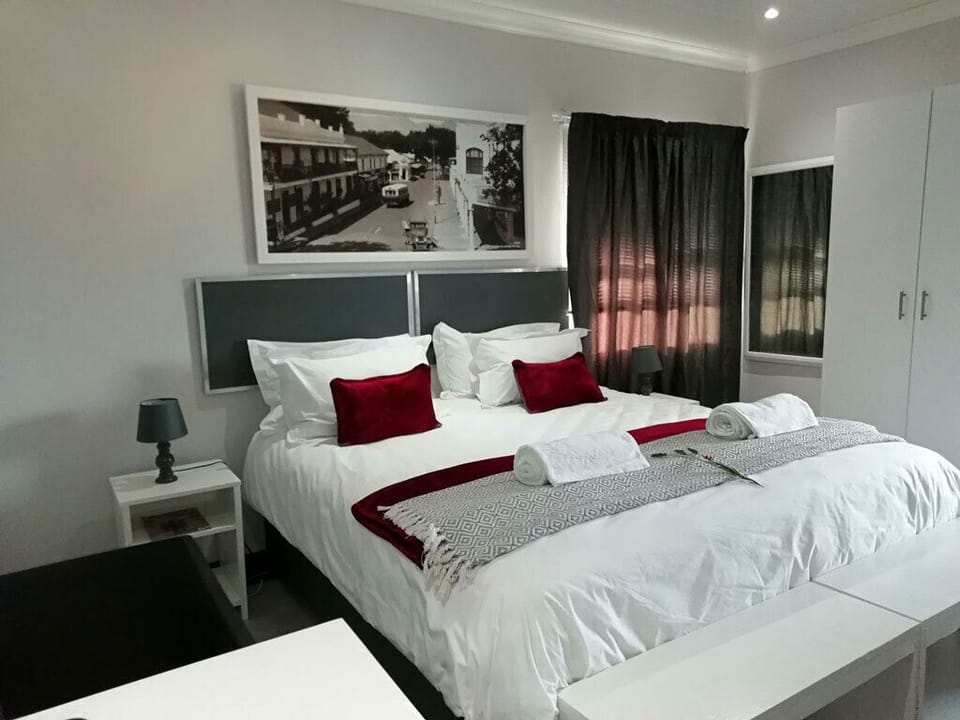 Blackout drapes, iron/ironing board (on request)