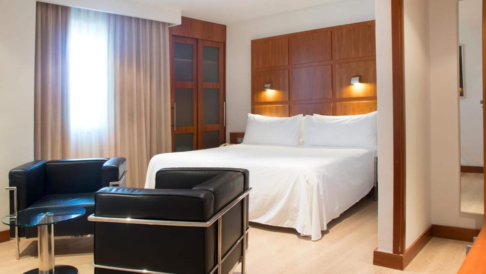 Down comforters, minibar, in-room safe, desk