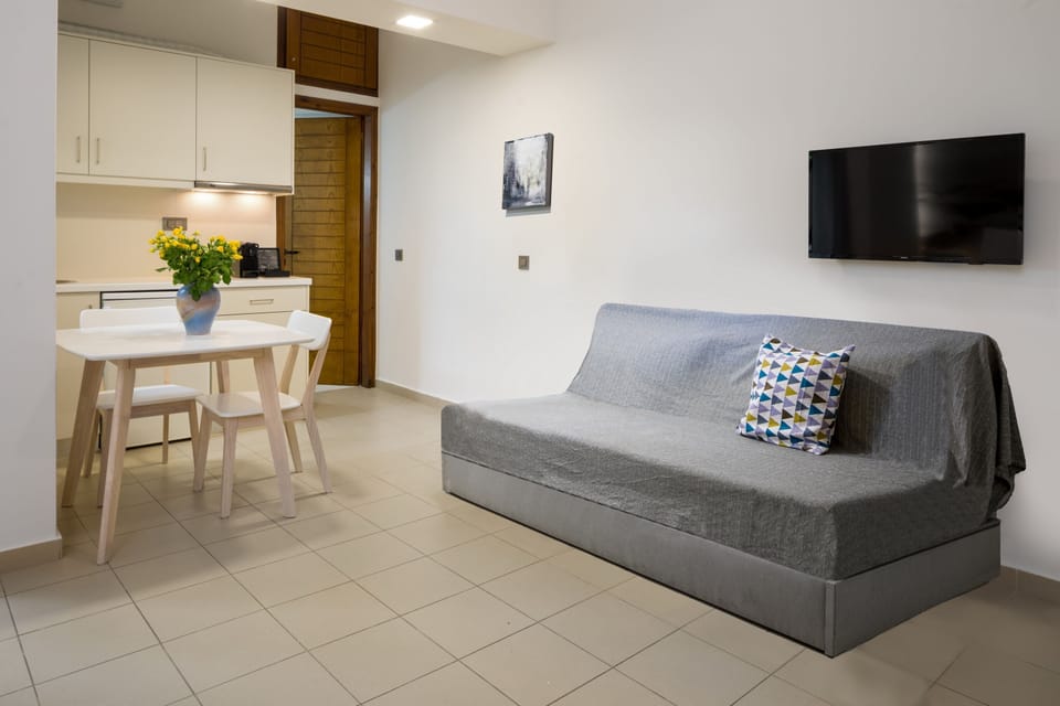 Superior Studio, Balcony | Living area | Flat-screen TV