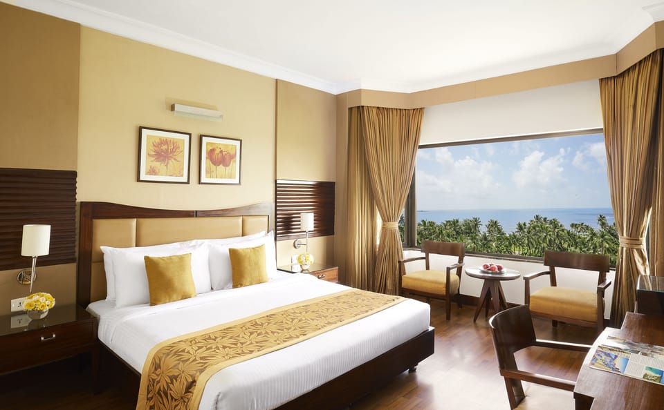 Deluxe King Bed, Pool View Room | Minibar, in-room safe, desk, WiFi