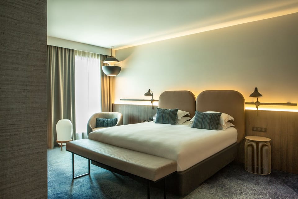 Premium Suite, 1 King Bed (Living Area) | Premium bedding, pillowtop beds, minibar, in-room safe