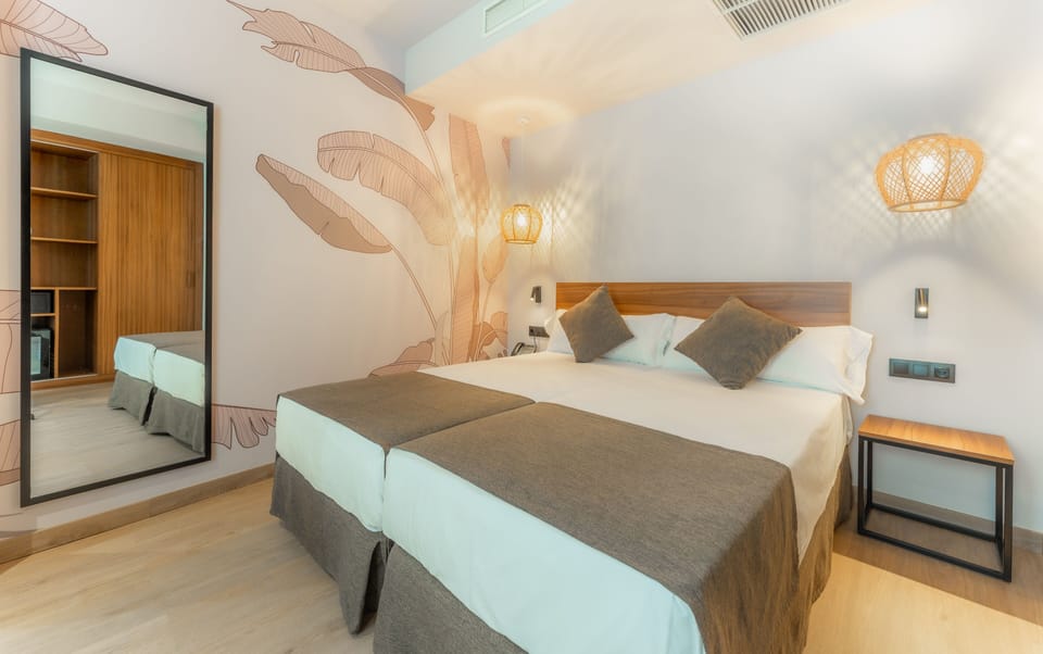 Standard Double Room | Minibar, in-room safe, individually decorated, individually furnished