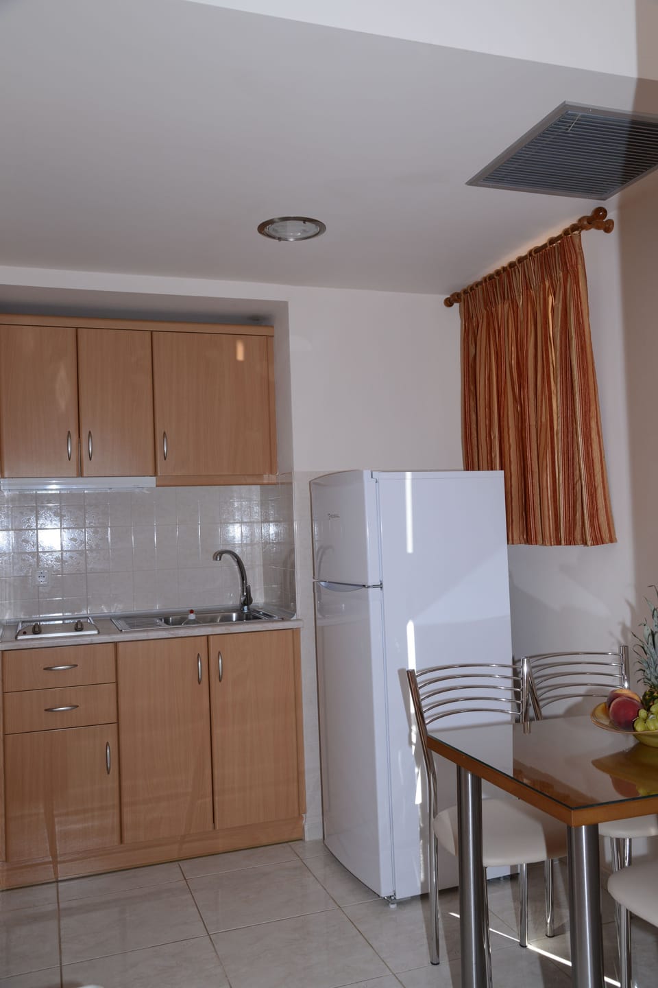 Family Studio Suite, Garden Area | Private kitchen | Full-size fridge, coffee/tea maker, electric kettle